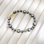 Black and Gold Tone Bracelet