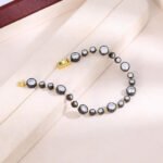 Black and Gold Tone Bracelet