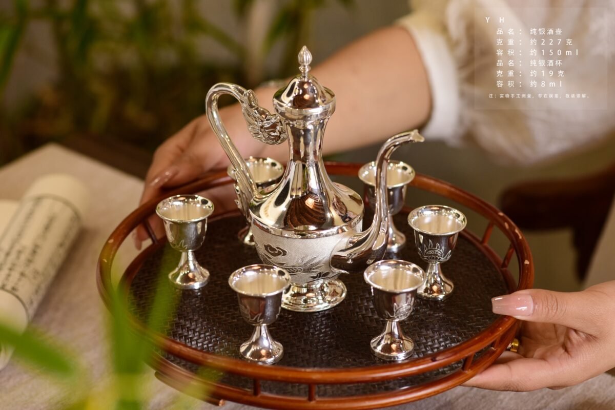 Polished Silver Pitcher and Stemmed Cups - original view 1