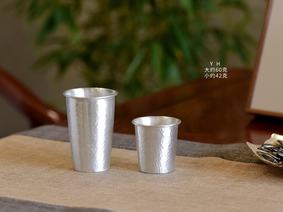 sandoos-2cf17beb39c5c6113febd816813f624db275327616ba6cf3bf50019c706eaaef Hammered Silver Cups in Two Sizes - original view 1