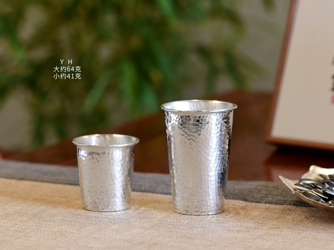 sandoos-c0a5302d8a116001222bca32dc6debc285b1339ecce41a395e36199a1ea5cacb Textured Silver Cups in Two Sizes - original view 1